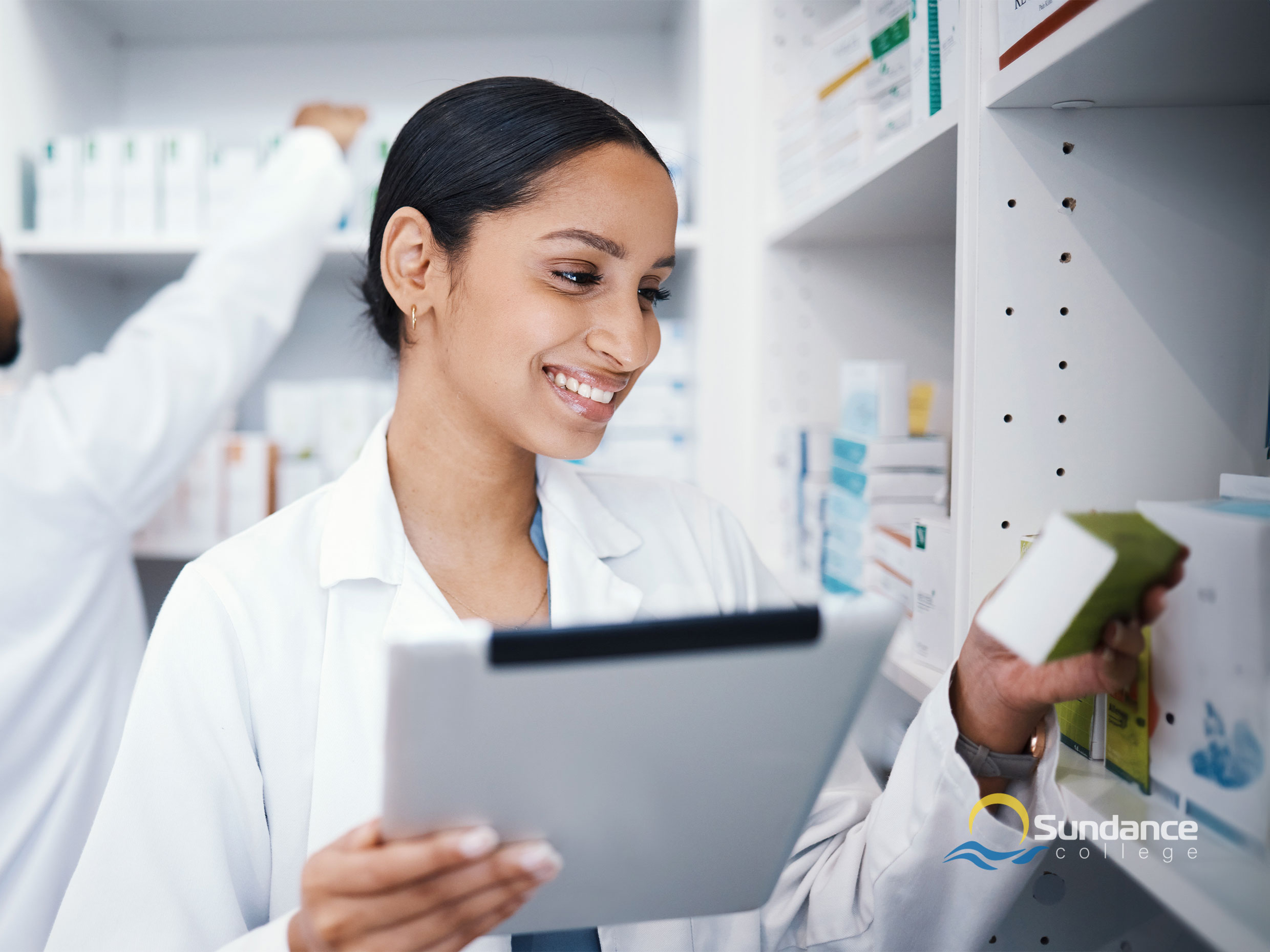 Pharmacy Assistant helping pharmacist find the right medication.